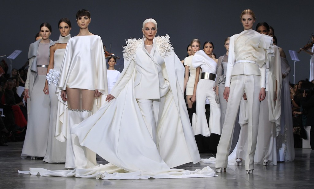 Carmen Dell'Orefice, 81, presents a creations by French designer Rolland as part of his Haute Couture Spring-Summer 2013 fashion show in Paris