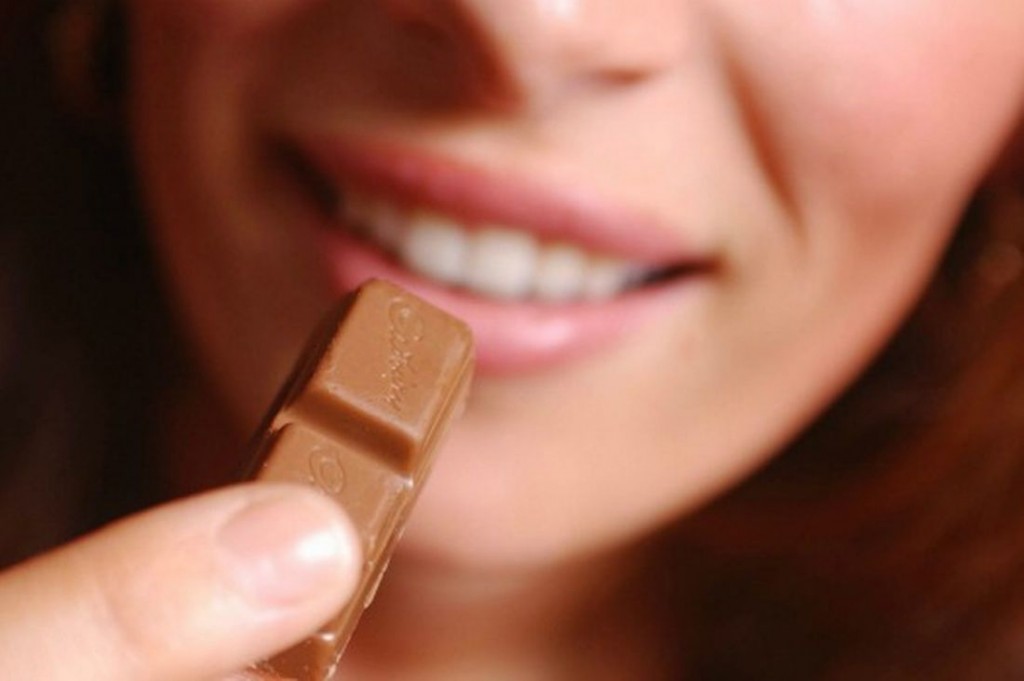 woman-eating-chocolate