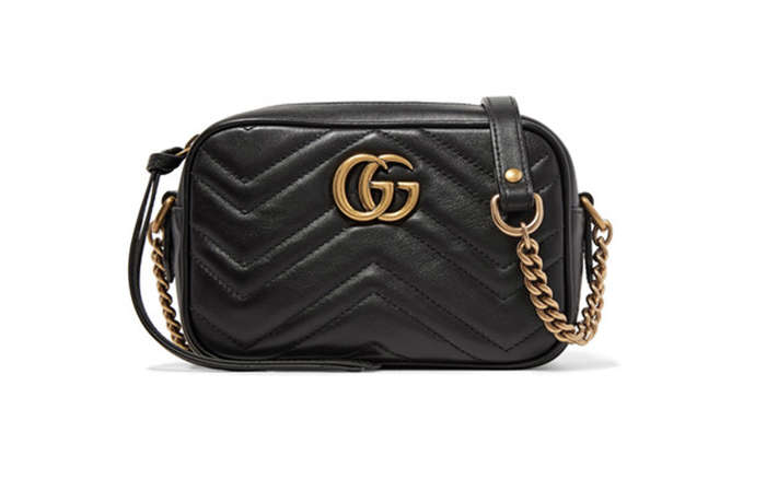 tui gucci duoi 1000 usd 06