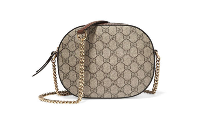 tui gucci duoi 1000 usd 09