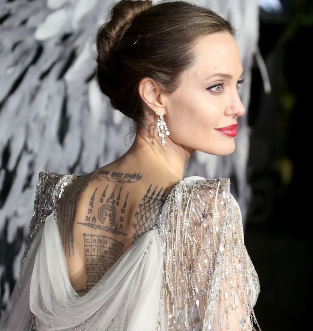 Ý nghĩa tâm linh đằng sau những hình xăm của Angelina Jolie 1