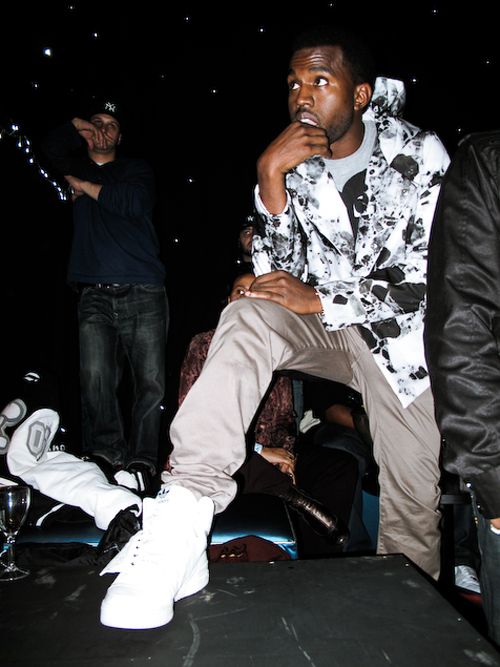 Kanye West wears a pair of white Jeremy Scott X Adidas Wings