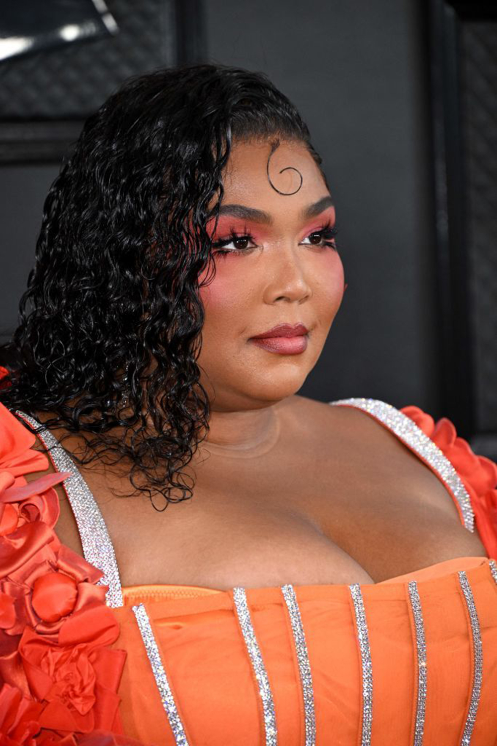 Singer Lizzo stands out on the red carpet.