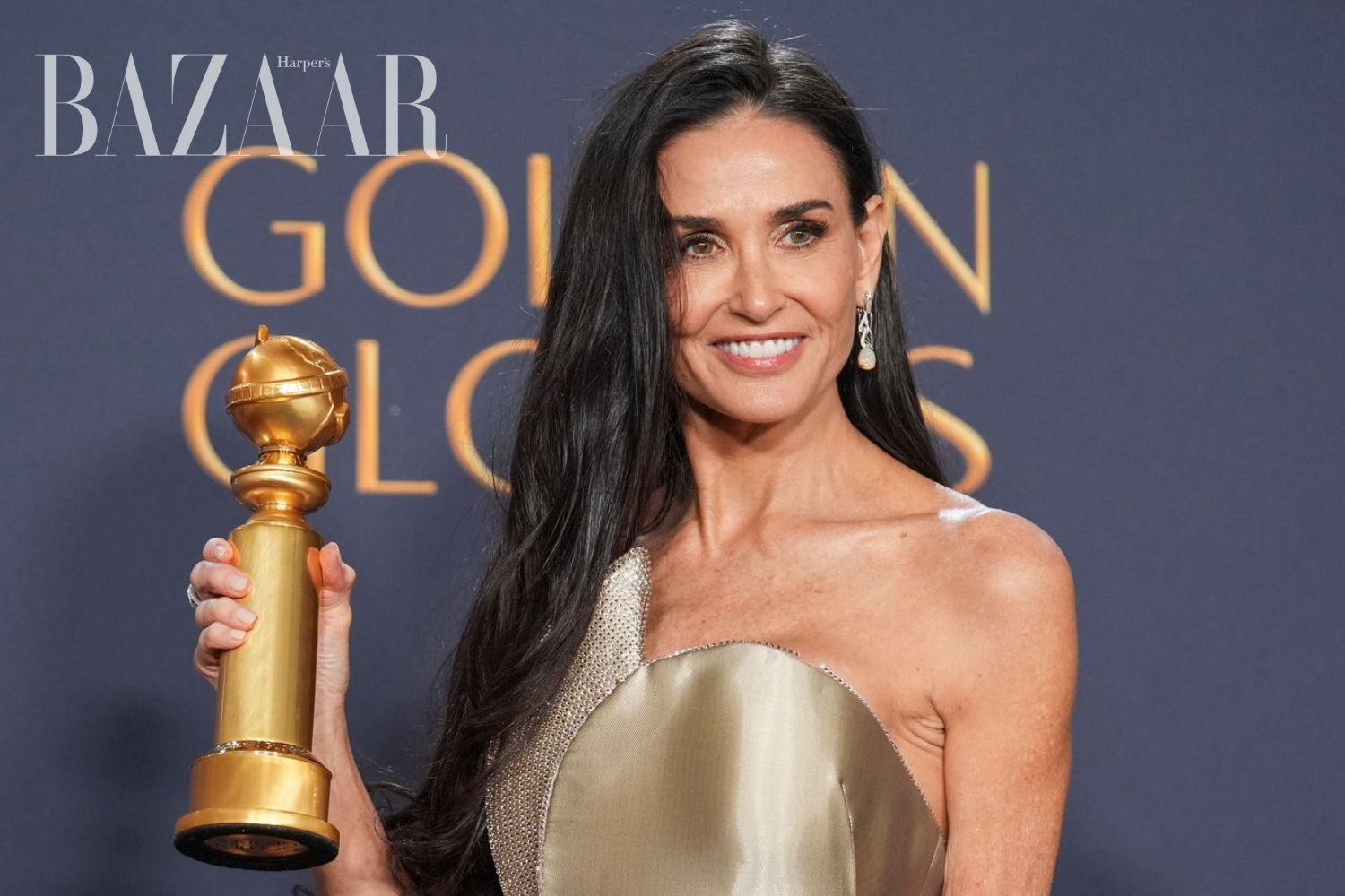 Demi Moore là chủ nhân của cúp Nữ diễn viên xuất sắc nhất ở thể loại phim nhạc kịch hoặc hài kịch tại Lễ trao giải Quả Cầu Vàng 2025. Ảnh: Getty Images