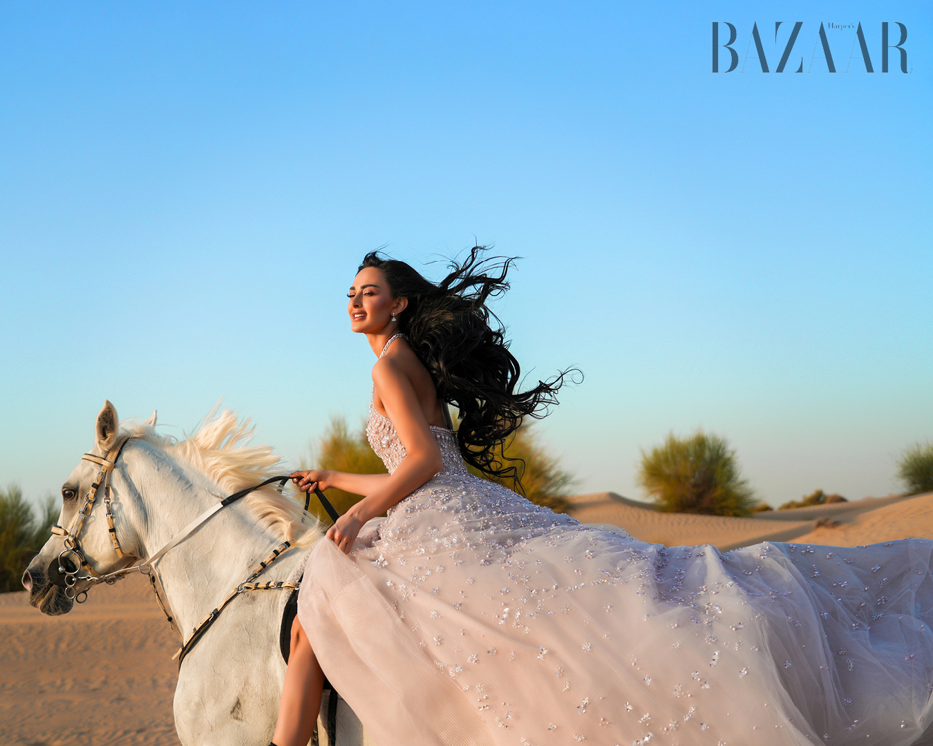Dr. Mahra Lutfi on horseback. 