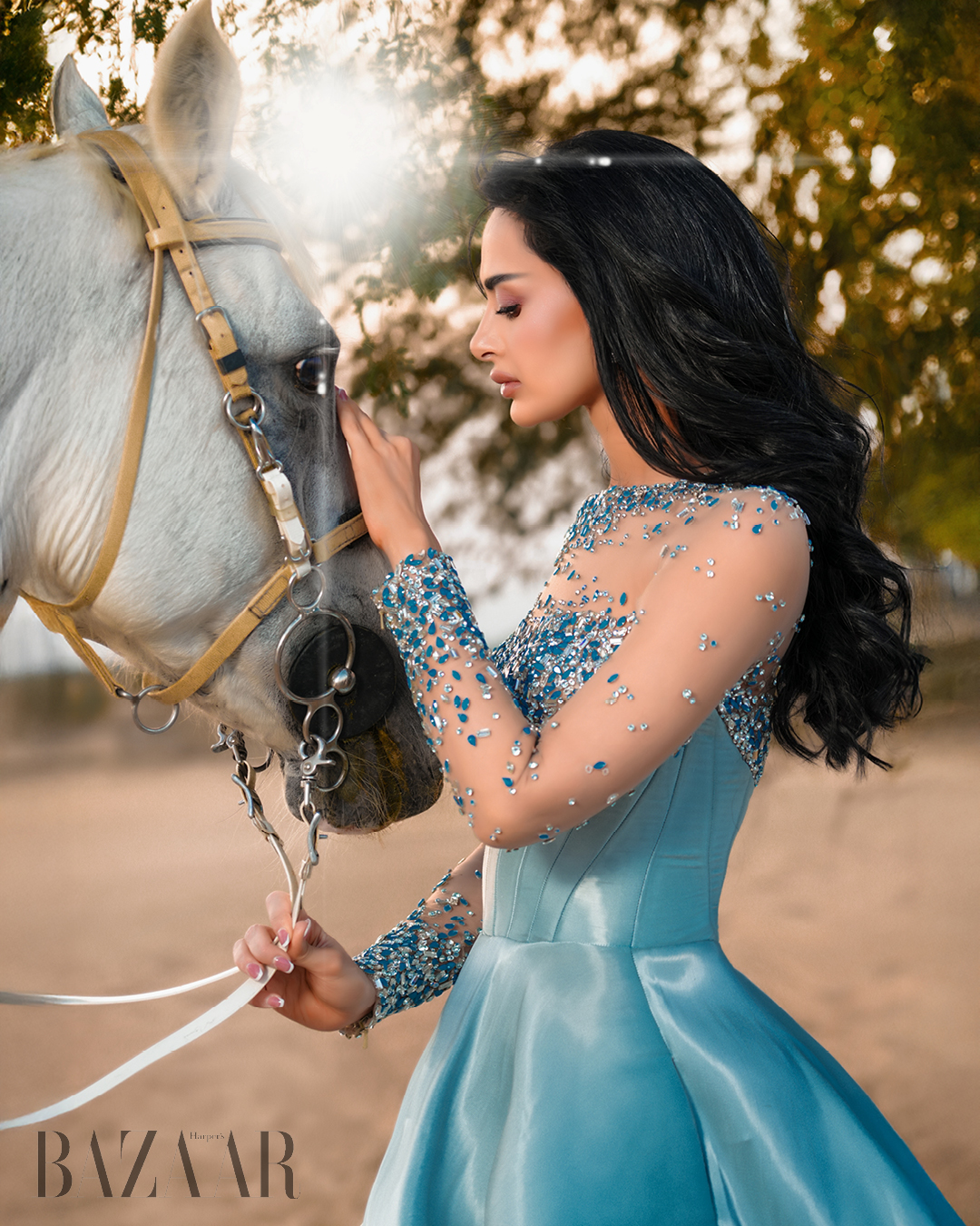 Dr. Mahra Lutfi is wearing stunning designs by world-renowned designer Michael Cinco.